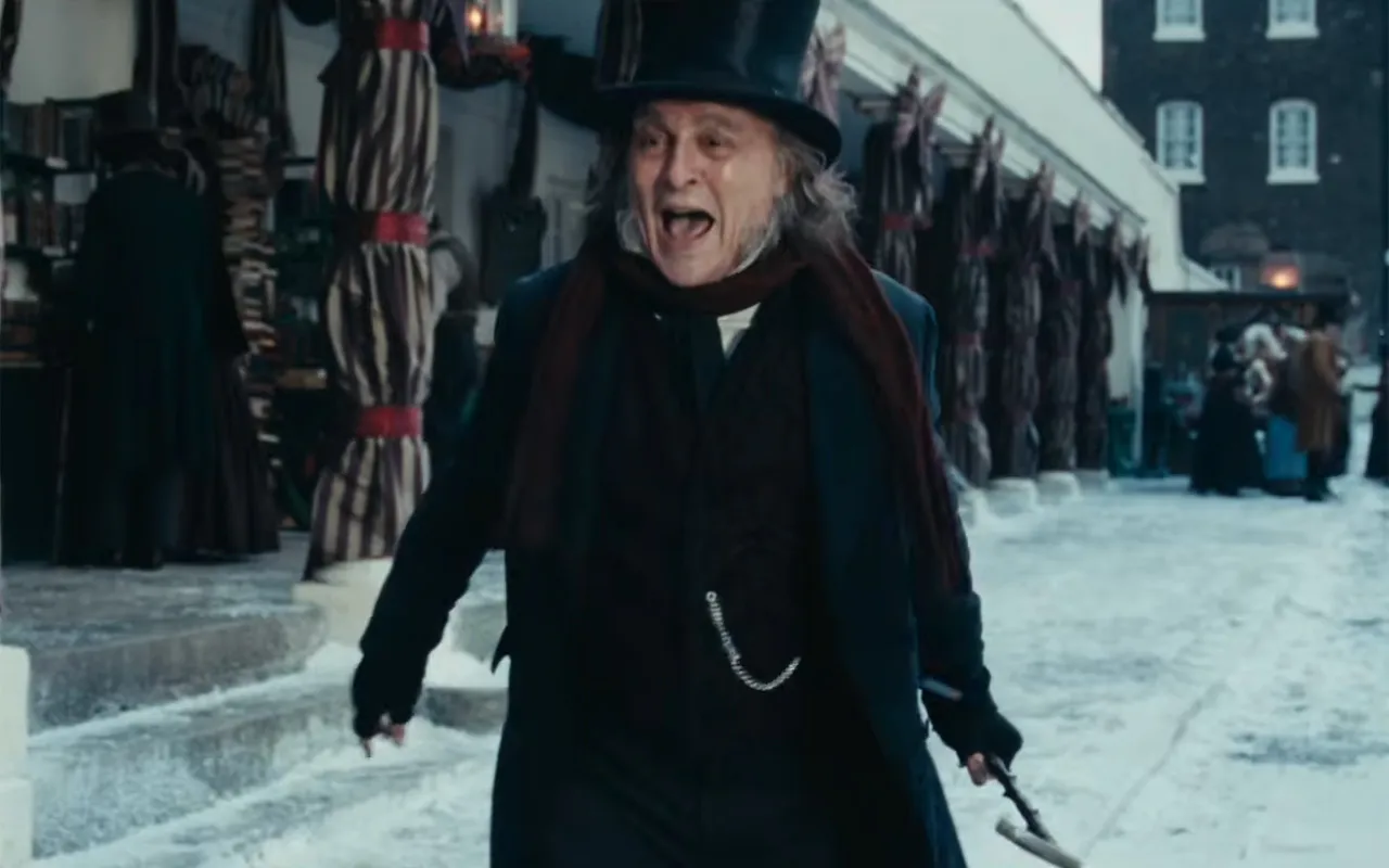 ‘Ebenezer: A Christmas Carol’ Trailer: Johnny Depp Stars as Grouchy, Snowball-Throwing Scrooge