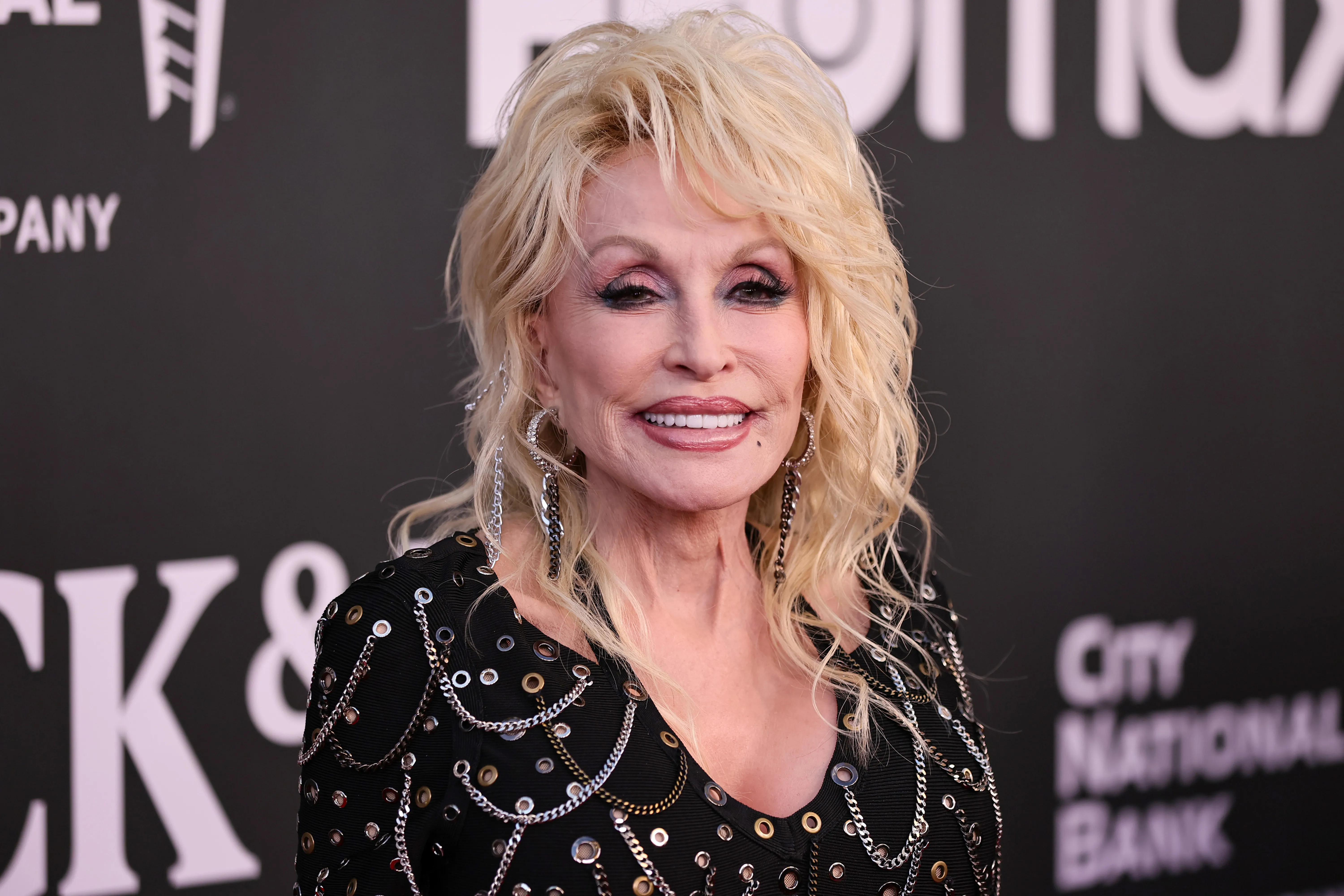 Dolly Parton Skips Dollywood Ride Opening Amid Ongoing Health Problems: ‘My Nashville Doctor Has Kinda Clipped My Wings’